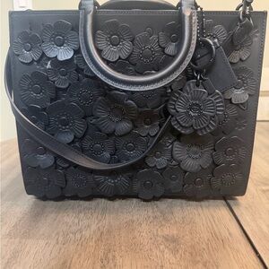 Coach Rogue bag with Tea Rose Applique in matte black glovetanned leather